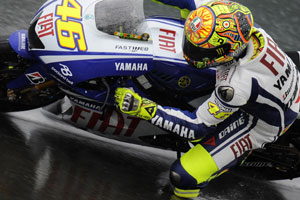 Rossi scored his third pole of the season in wet conditions overnight