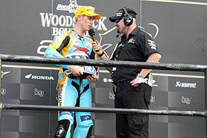 Herfoss with Phil Harlum after Australian Supersport race two at Eastern Creek on Sunday