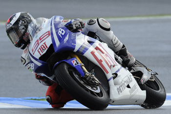 Yamaha's Lorenzo was quickest in the wet on Friday at Estoril.