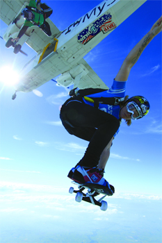 Jolene Van Vugt skates out of a plane in a Nitro Circus Live promotion in NZ.