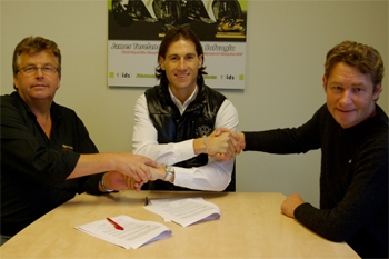 Spanish star Ruben Xaus signs with Ten Kate Racing owners Gerrit and Ronald ten Kate.