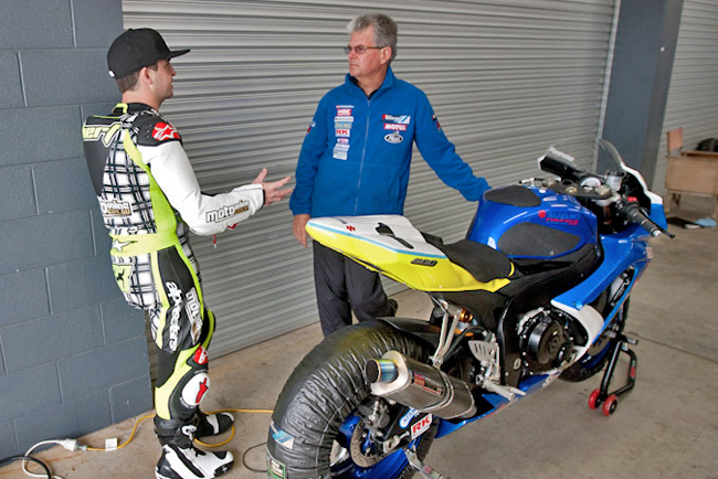 Gobert and Team Suzuki boss Phil Tainton debrief in between sessions at the Island.